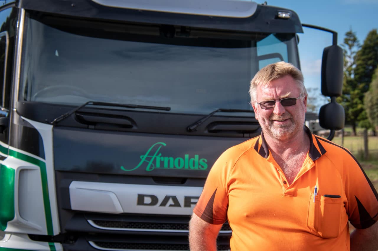 a man standing next to a daf vehicle
