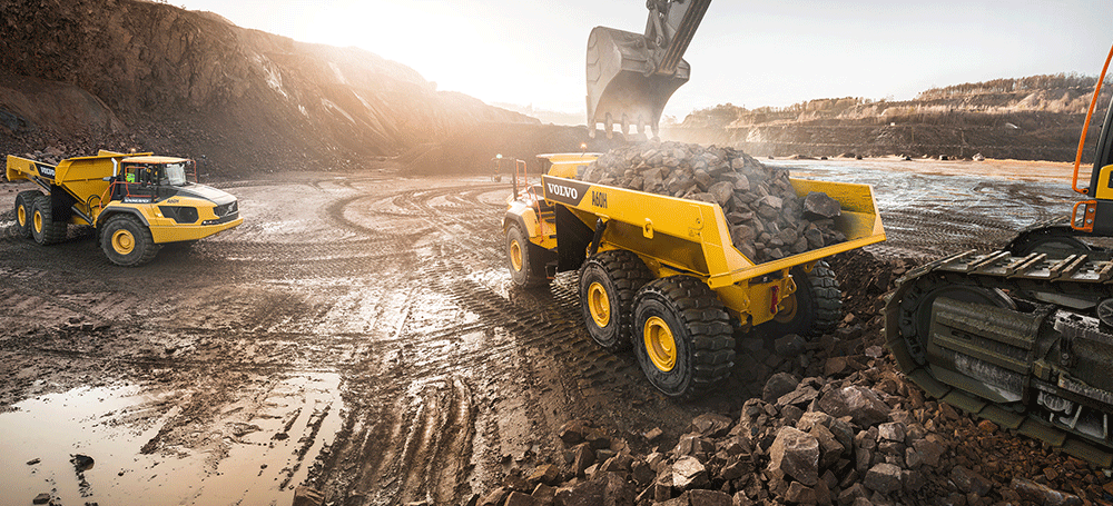 two trucks at a site