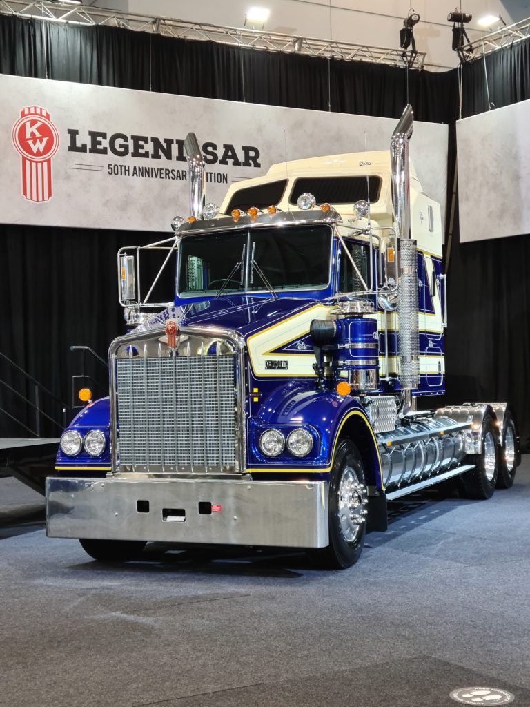 a kenworth legend sar truck at a truck expo